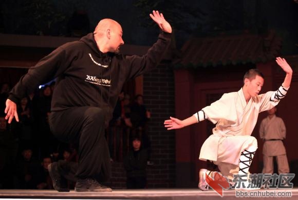 A-Chinese-monk-practices-Kong-Fu-with-an-American-martial-arts-tourist-at-the-Sh.jpg
