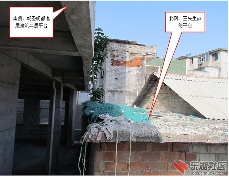 附件3朝圣明都高层建筑与王先生的住房间隔照片.jpg