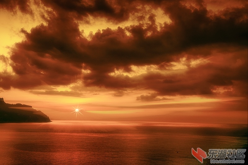 海边落日余晖曾院平摄影.jpg