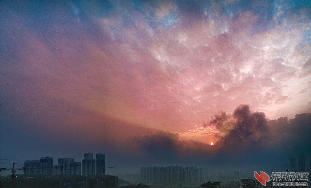 日落渝雾见太阳曾院平摄影.jpg